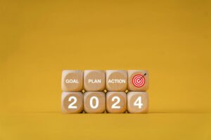 Growth goals in 2024 goal, plan, action. Success goal concept. Wooden block with the numbers 2024